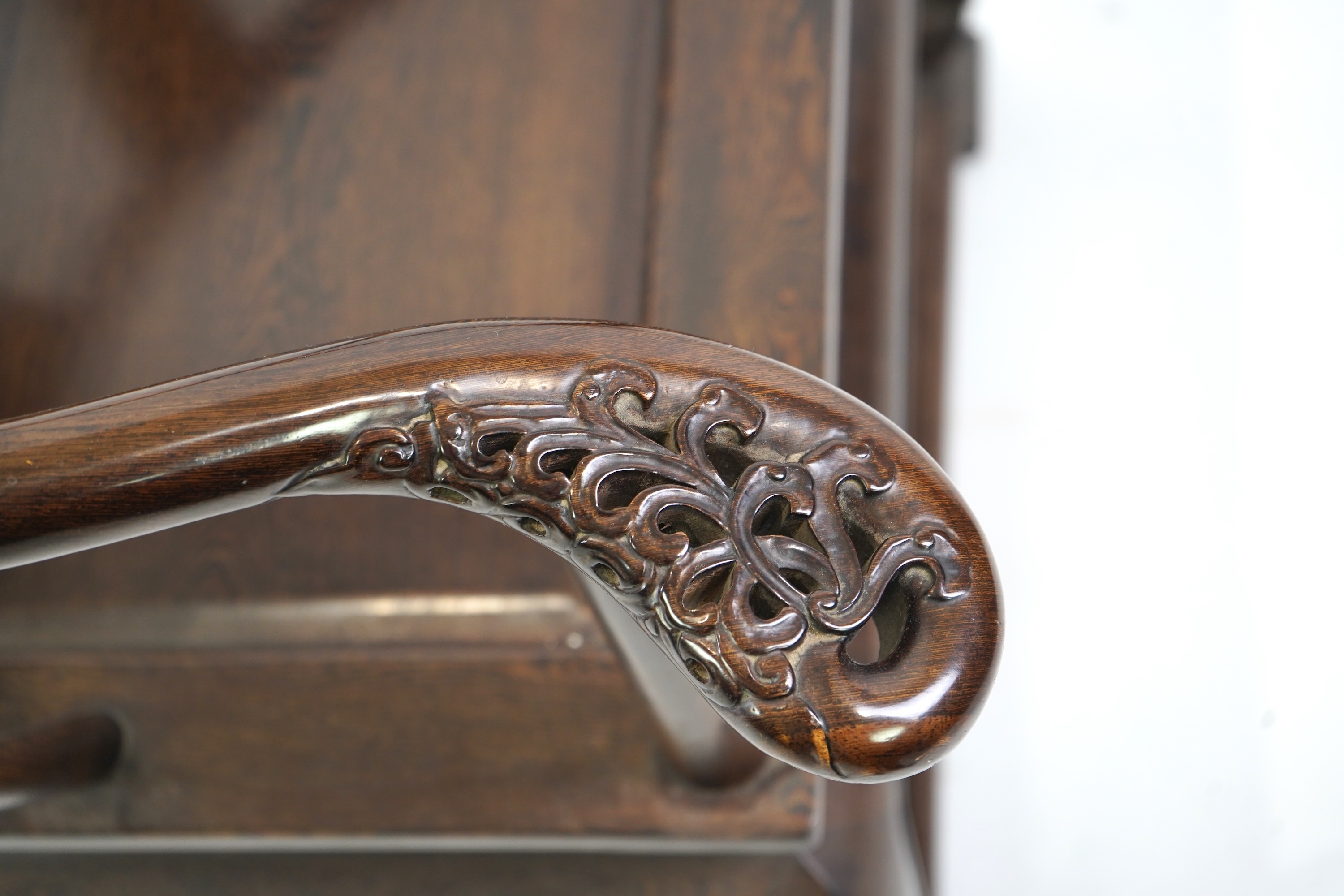 A pair of Chinese jichimu horseshoe shaped armchairs and a matching table, 19th/20th century
